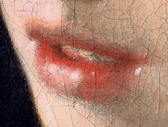 唇の右端にある白い点（『真珠の耳飾りの少女』　1665年頃　フェルメール　マウリッツハイス美術館蔵）